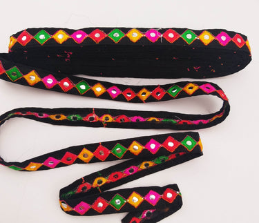 Wholesale Black Cotton Fabric Mirrored Trim With Embroidery In Yellow, Fuchsia Pink, Red & Green Threads